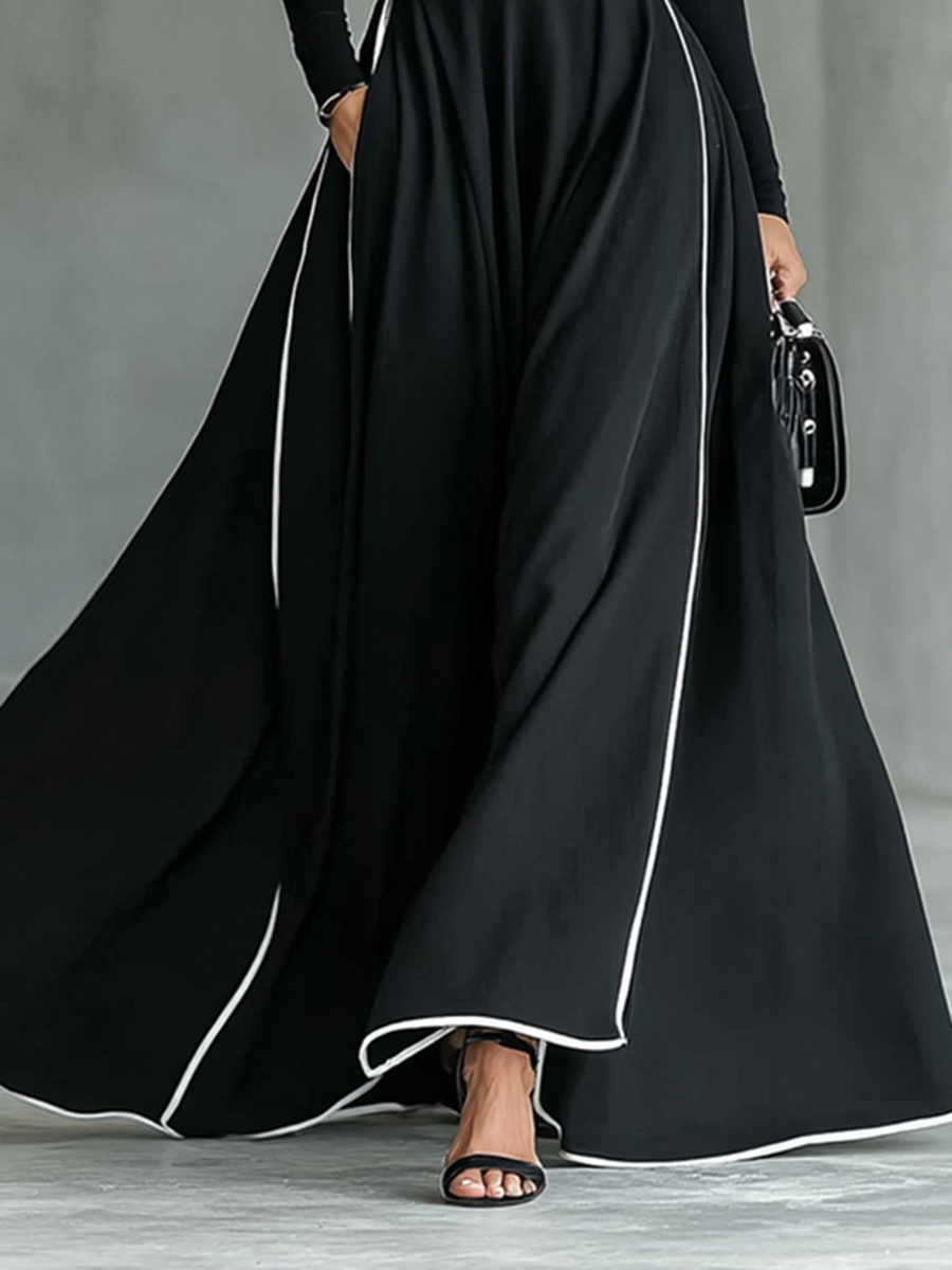MARTINA | ROBE MAXI NOIRE AVEC COUTURES BLANCHES ET COL HAUT